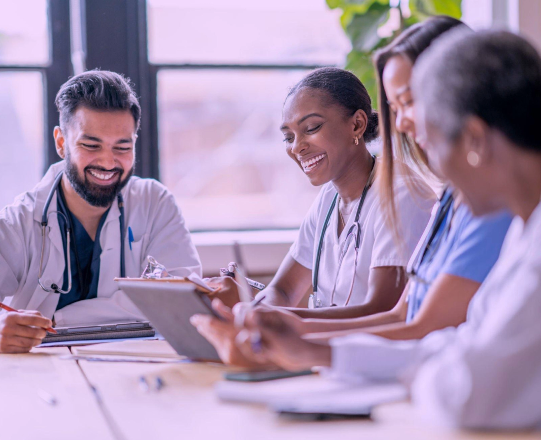 Medical team discussing patient care plans in a conference room